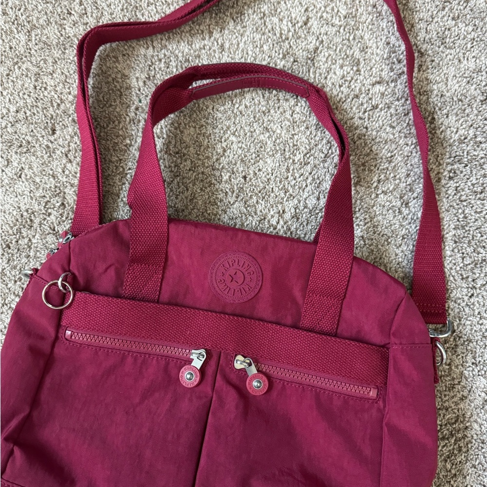 Kipling Red Shoulder Bag with Adjustable Strap and Durable Fabric